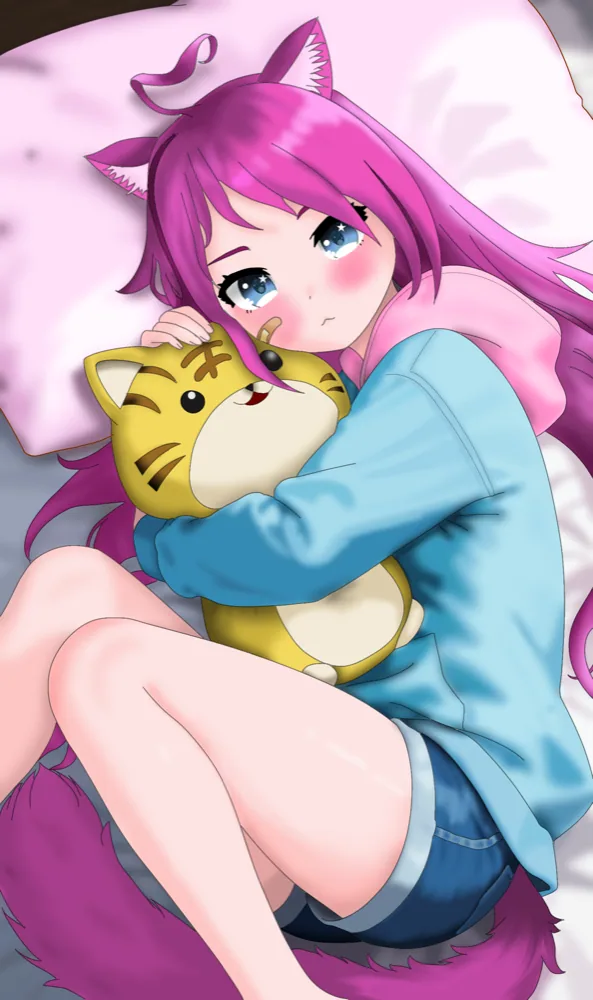 Yuky tumbada en la cama abrazando un peluche de tigre